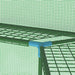 Green mesh greenhouse interior with metal shelving and blue corner joint.