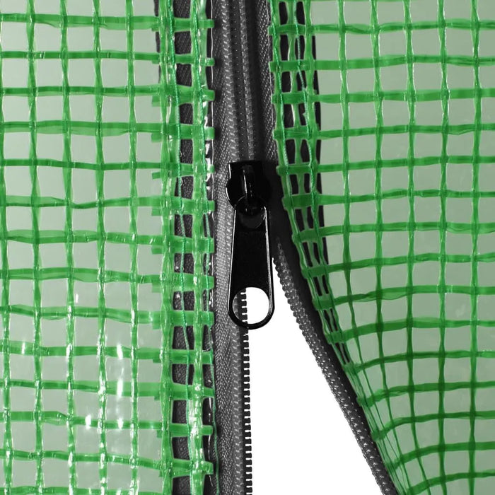 Close-up of green mesh PE greenhouse cover with black zipper