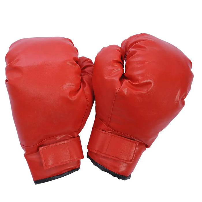 Pair of red boxing gloves with velcro straps isolated on white background