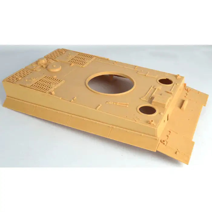 Unassembled tan 1/16 scale RC Tiger tank upper hull plastic model part on white background