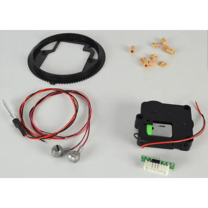 Self-assembly 1/16 RC Tiger tank parts kit with gears, wires, motor, and connectors on white background