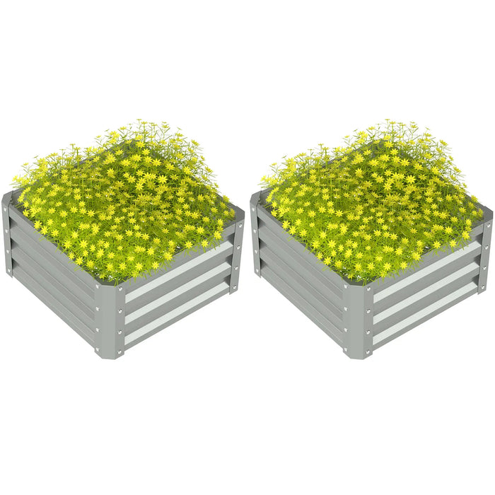 Two gray metal raised garden beds filled with dense yellow flowering plants on white background
