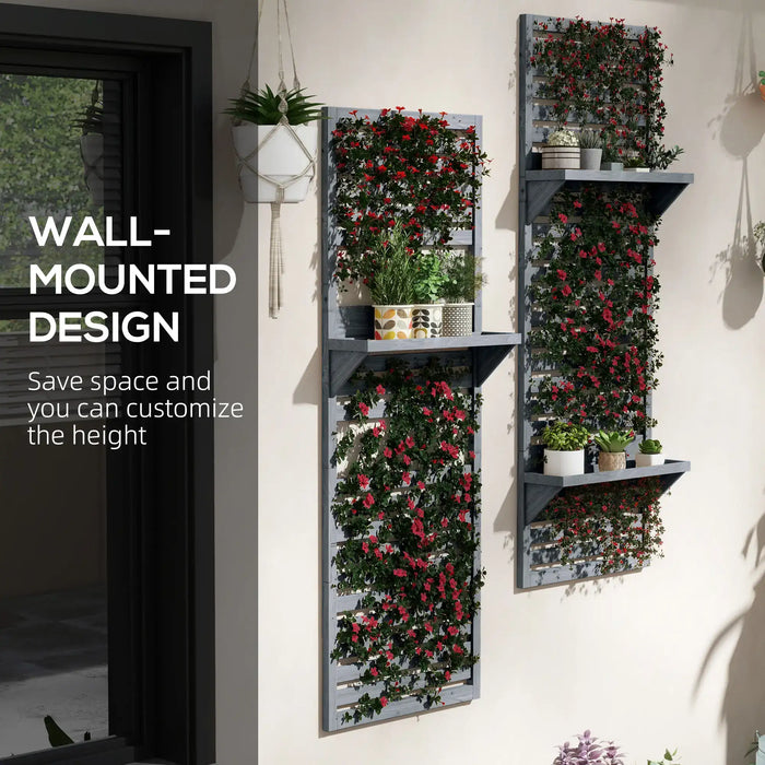 Set of 2 grey wooden wall-mounted plant stands with trellis and shelves holding potted plants and flowers