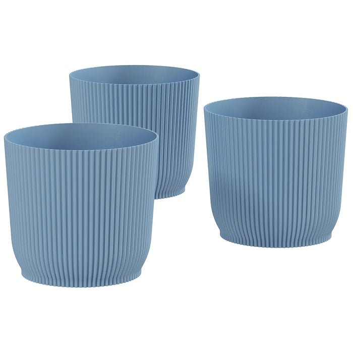 Set of three blue stackable ribbed plastic plant pots for indoor and outdoor use