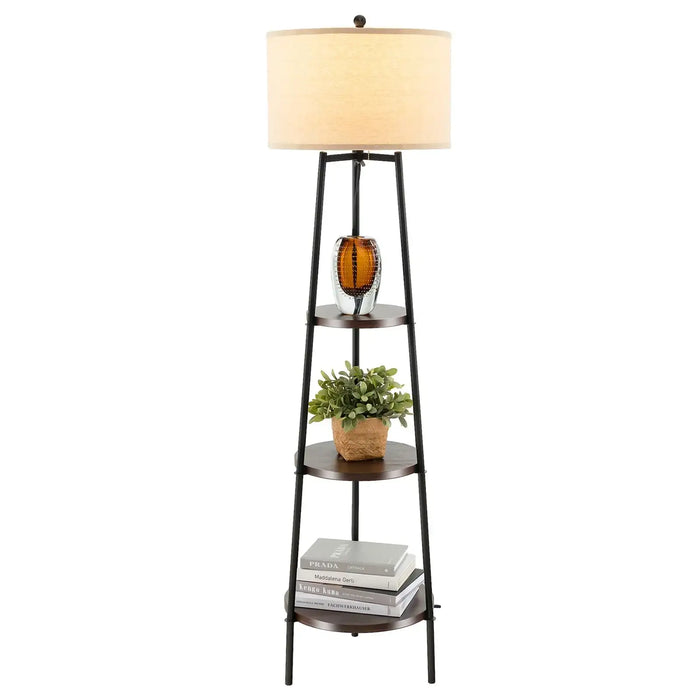 Three-tiered floor lamp with a lampshade, plant, and books on a white background