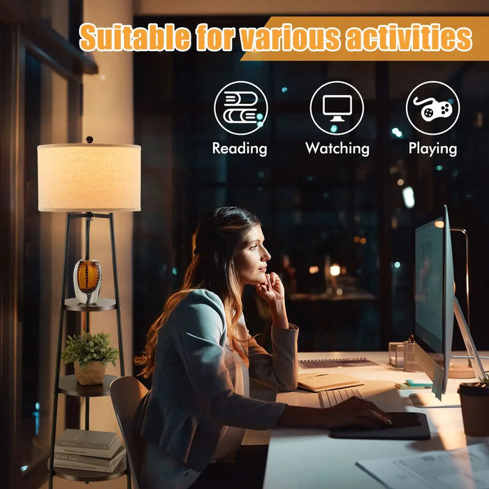Woman sitting at a desk with a computer setup, suitable for reading, watching, and playing.
