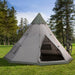 Large grey six-person tipi tent with open door on grass, trees and bicycle beside