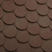Close-up of brown plastic dog house roof with scale tile pattern