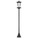 Modern black outdoor street lamp post with lantern-style light fixture and clear glass panels