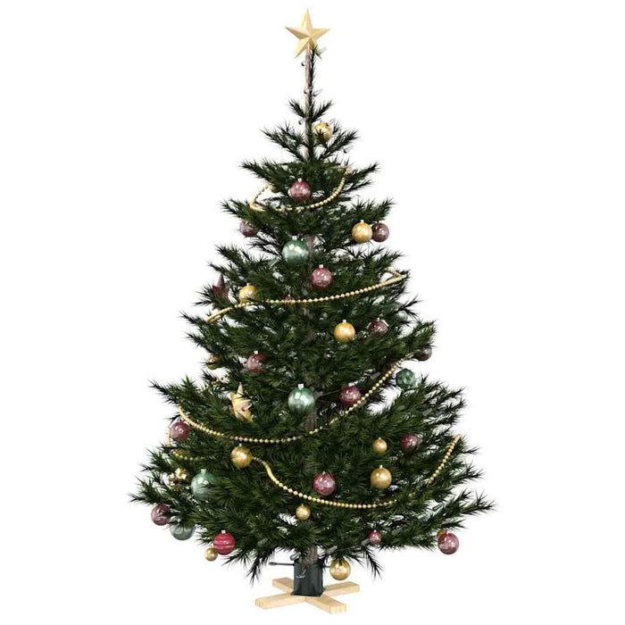 Decorated Christmas tree with gold star topper and colorful baubles on white background