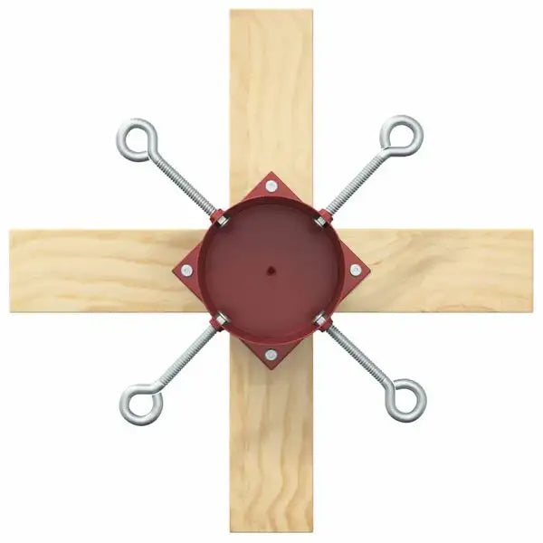 Overhead view of wooden cross with a red metal clamp secured by four adjustable metal eye bolts