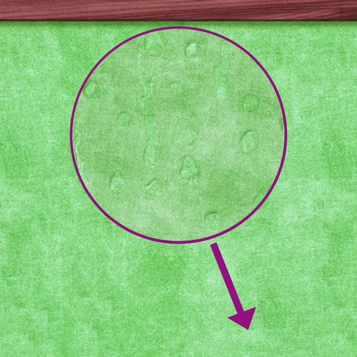 Close-up of green water-resistant roof fabric with droplets, highlighted by a purple circle and arrow.