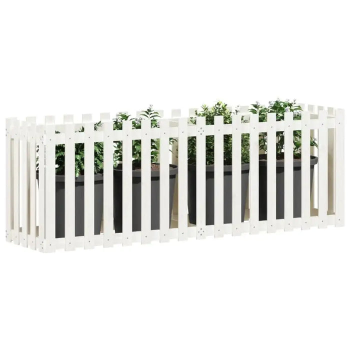 Solid pinewood garden raised bed with white picket fence and potted green plants