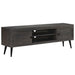 Dark wooden TV stand with two cabinet doors and two open shelves on angled black legs