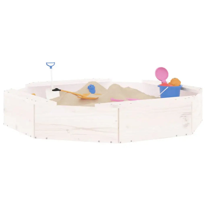 Square wooden sandbox with four corner seats, white finish, toys and sand inside