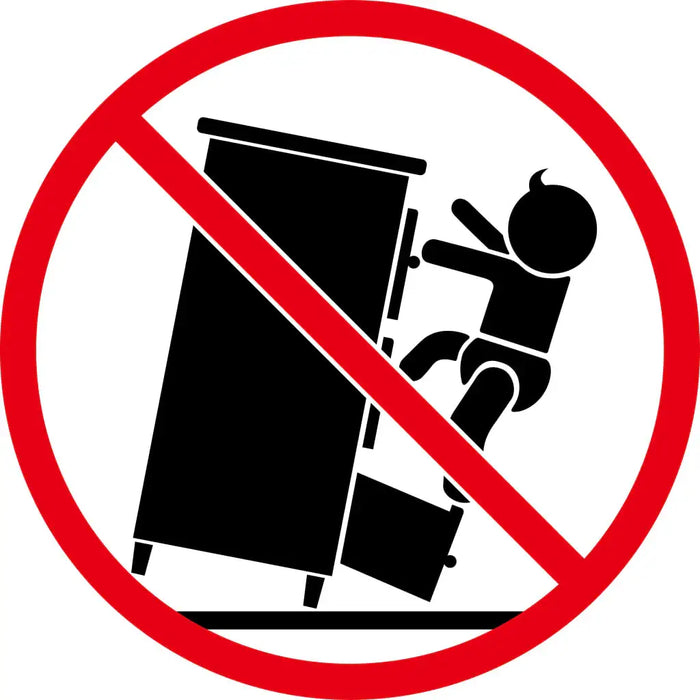 Warning sign showing a child tipping over a cabinet with a red circle and slash prohibiting this action