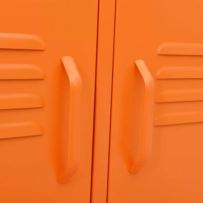 Close-up of bright orange steel TV cabinet doors with integrated handles and ventilation slats