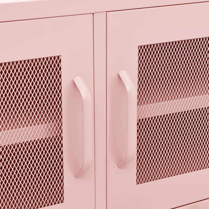 Close-up of pink metal cabinet doors with curved handles and diamond mesh panels