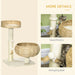 Cat tree with sisal posts and hanging ball toy, featuring woven basket beds on a beige base