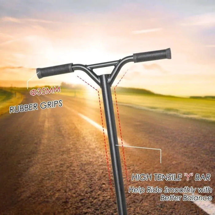 Gold stunt scooter with 35mm rubber grips and high tensile Y bar on an open road at sunset