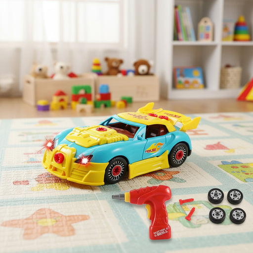 Take apart toy racing car with drill, wheels, and screws on a play mat in a kids' room