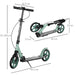 Green teen and adult kick scooter with folding design, dual brake system, and size dimensions.