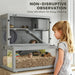 Three-tier grey wooden hamster cage with clear windows, accessories, and two hamsters observed by young girl