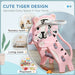 Pink tiger-themed kids slide with basketball hoop in playroom, nursery, or living room setting