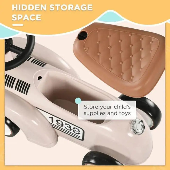 Cream toddler ride-on sliding car with hidden storage compartment under brown seat