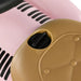 Close-up of pink toddler ride-on sliding car foot-to-floor seat detail with black knob