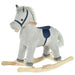 Grey and white striped plush rocking horse with wooden base and blue saddle
