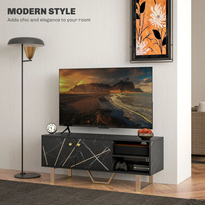 Modern black marble-effect TV stand with gold accents and storage, 50-inch TV, floor lamp, and wall art