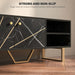 Black TV stand with storage and marble effect finish, gold diagonal handles, and sturdy gold legs on wooden floor