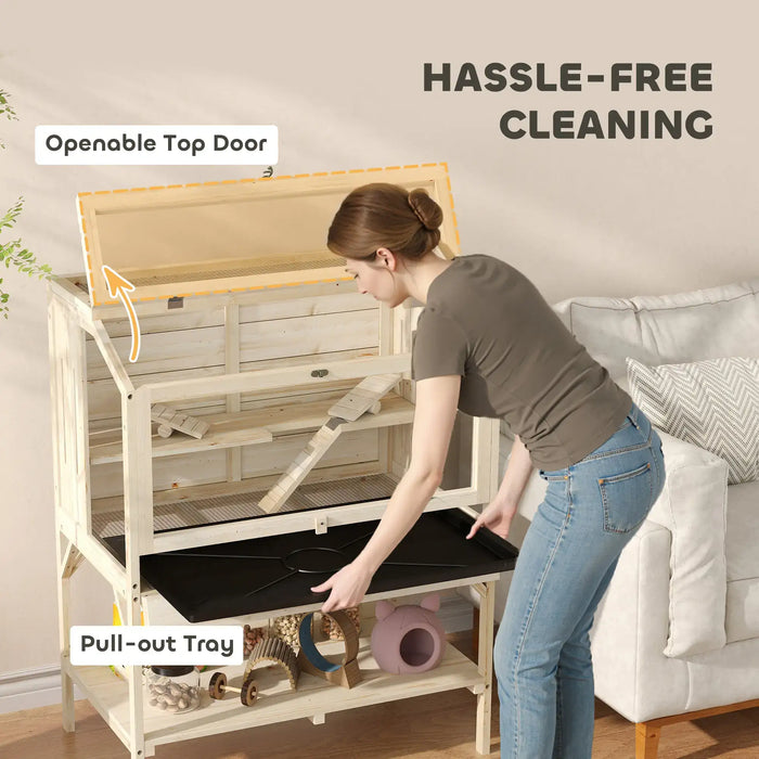 Woman cleaning wooden pet cage with openable top door and pull-out tray for easy maintenance
