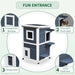 Two-tier grey outdoor wooden cat house with escape door, window, front eave door, and jump platforms