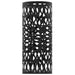 Black metal umbrella stand with geometric pattern on a white background