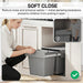 Woman pulling out gray dual 15L under sink recycling bin with soft close runners in white kitchen cabinet