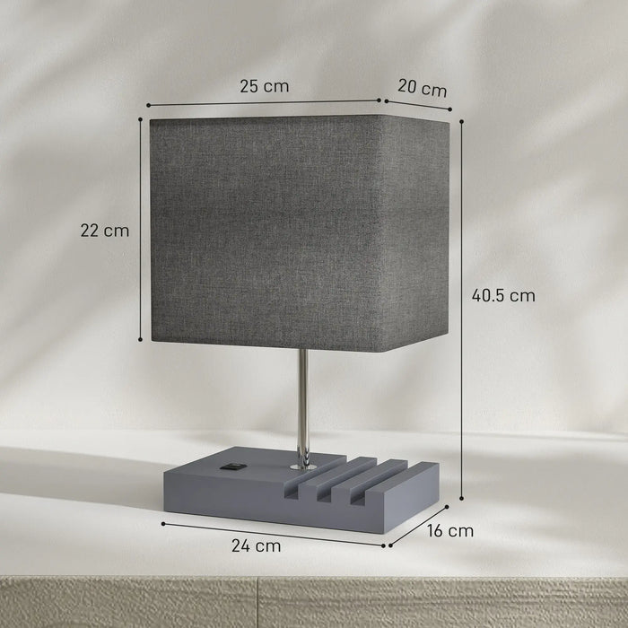 Gray table lamp with dimensions labeled on a neutral background