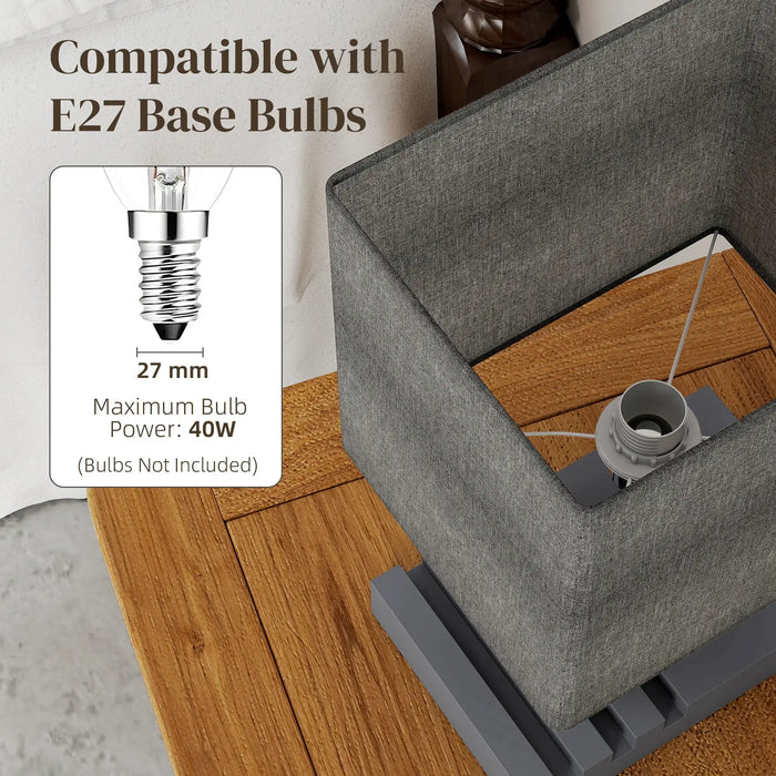 Gray lampshade with bulb holder on a wooden floor, showing compatibility with E27 base bulbs.