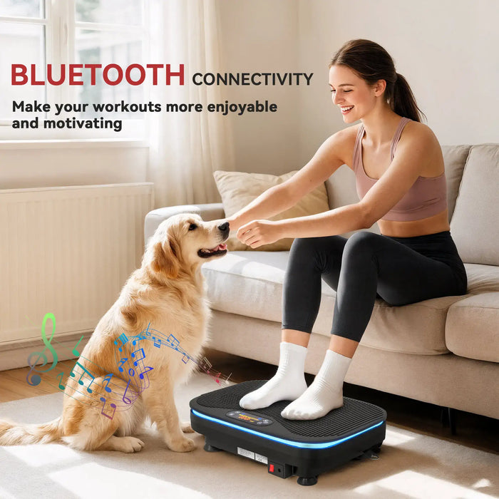 Woman exercising on a vibration plate with a dog sitting next to her in a living room.