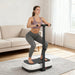 Woman using a vibration plate in a living room
