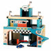 Vilac vintage wooden three-storey toy car garage with spiral ramp, checkered flags, and blue wooden car