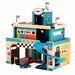 Vilac vintage wooden three-storey toy garage with blue spiral ramp and small wooden car