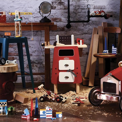 Vintage wooden kids workbench and retro construction playset with toy tools and car