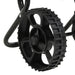 Close-up of black plastic wheel on walk-behind salt and fertilizer spreader frame