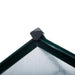 Close-up of greenhouse roof corner with green aluminium frame and polycarbonate panel