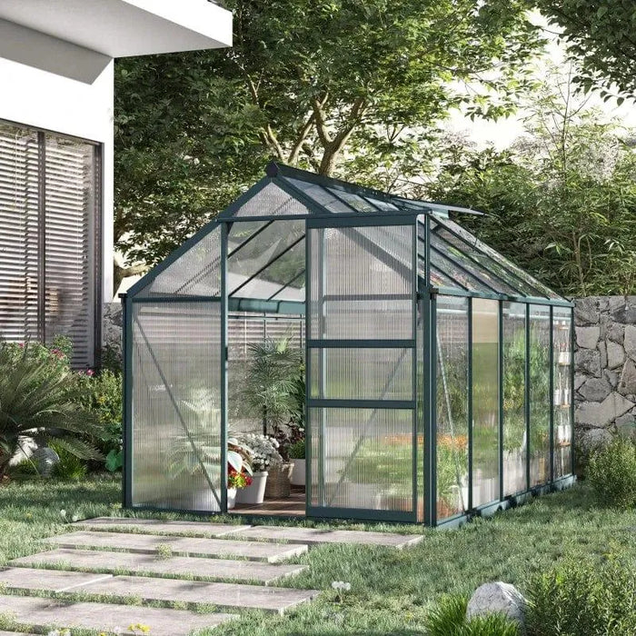 Walk-in aluminium frame greenhouse with sliding door and roof vent in garden setting
