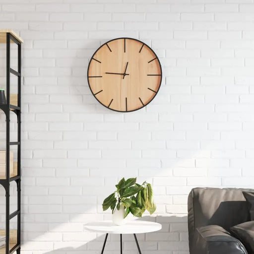 Rustic wooden wall clock with silent quartz movement on white brick wall above minimal white table and gray sofa