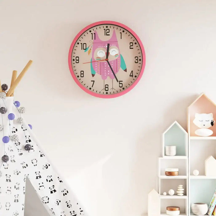 Wall clock with owl design in a child's room