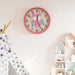 Wall clock with owl design in a child's room